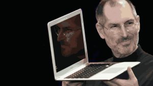 Apple's founder Steve Jobs showcases Apple's latest laptop.